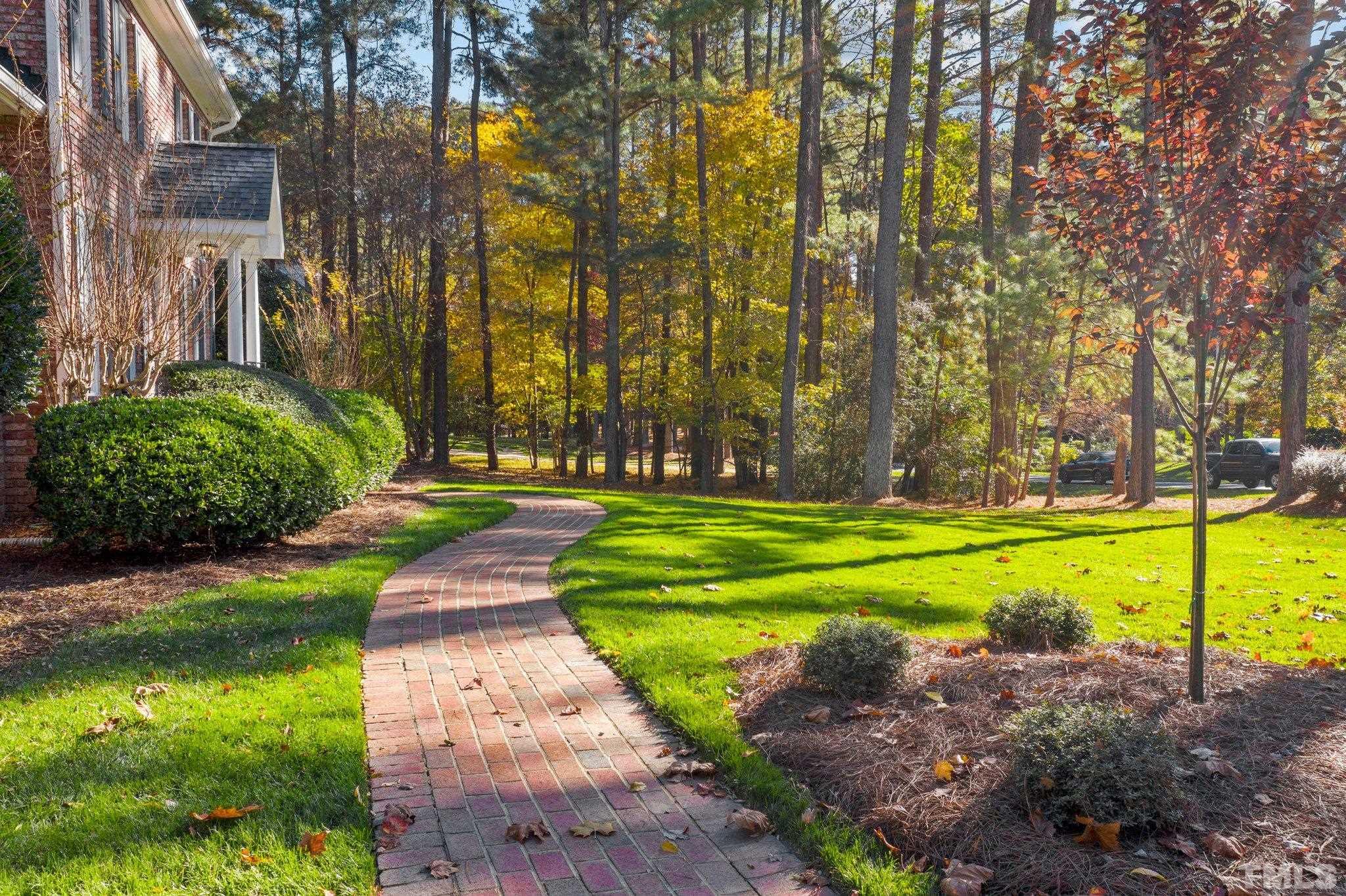 1024 White Crane Way Raleigh, NC 27615 - Photo 5 of 30 a view of a park with large trees