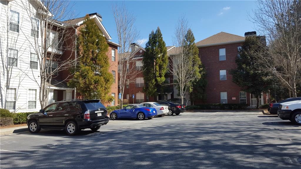 5641 Roswell Road, Unit 106 Atlanta, GA 30342 - Photo 4 of 5 a car parked in front of a building