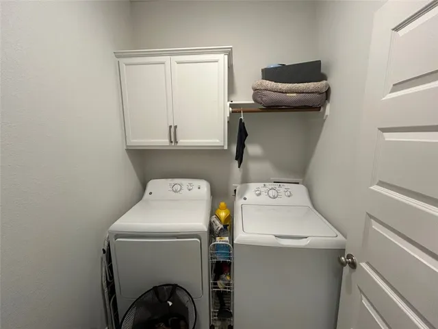 a view of a workspace with furniture