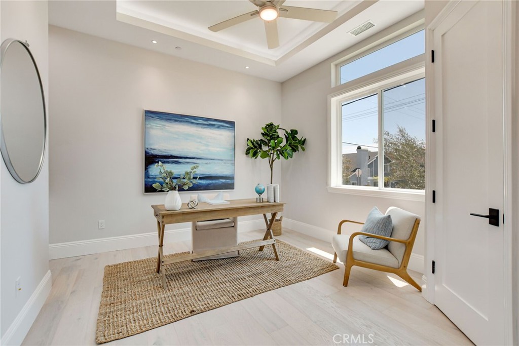 1725 Clark Lane Redondo Beach, CA 90278 - Photo 19 of 47 a living room with furniture a window and a potted plant