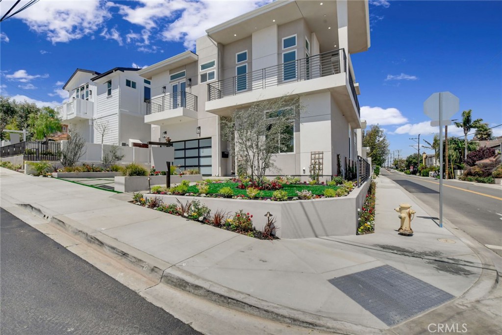 1725 Clark Lane Redondo Beach, CA 90278 - Photo 2 of 47 front view of house with a street