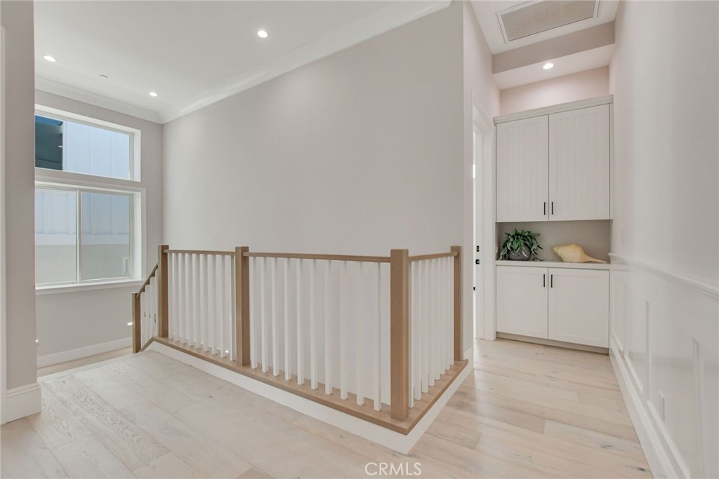 1725 Clark Lane Redondo Beach, CA 90278 - Photo 24 of 47 a view of a hallway with white cabinets