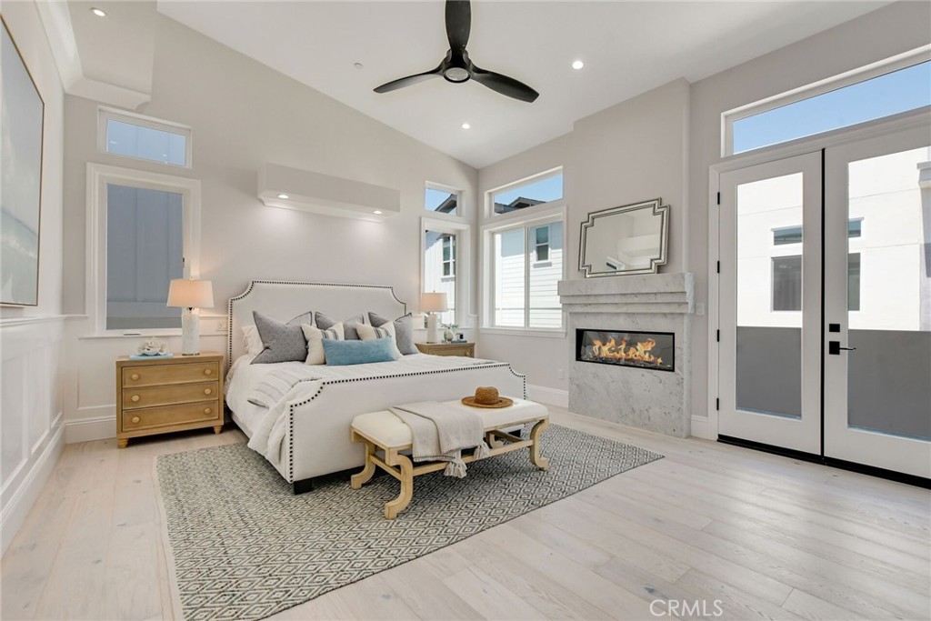 1725 Clark Lane Redondo Beach, CA 90278 - Photo 25 of 47 a bed room with a bed and a chandelier