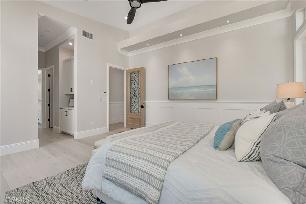 1725 Clark Lane Redondo Beach, CA 90278 - Photo 27 of 47 a bedroom with a bed and a painting on the wall