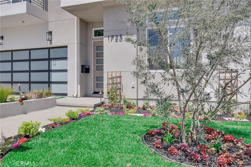 1725 Clark Lane Redondo Beach, CA 90278 - Photo 3 of 47 a view of a house with a yard and garden