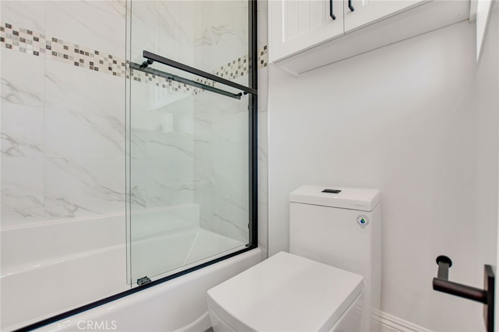 1725 Clark Lane Redondo Beach, CA 90278 - Photo 35 of 47 a bathroom with a shower and bathtub