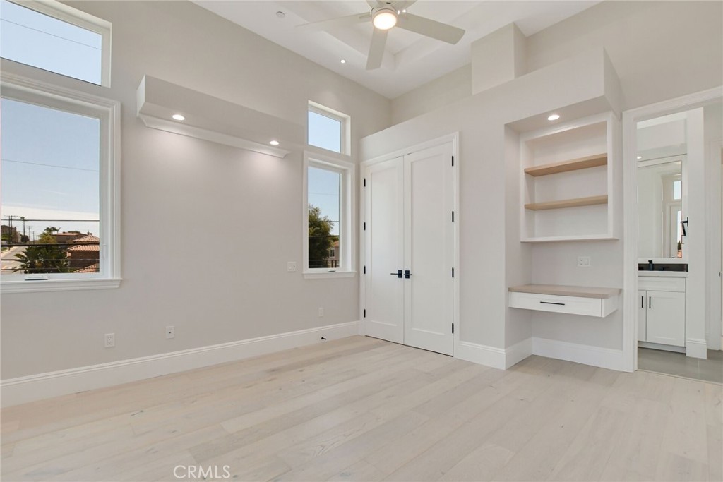 1725 Clark Lane Redondo Beach, CA 90278 - Photo 37 of 47 a view of a room with a stylish ceiling fan and entryway