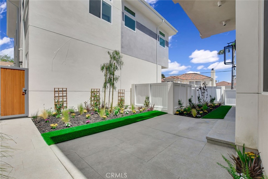1725 Clark Lane Redondo Beach, CA 90278 - Photo 42 of 47 a front view of a house with garden