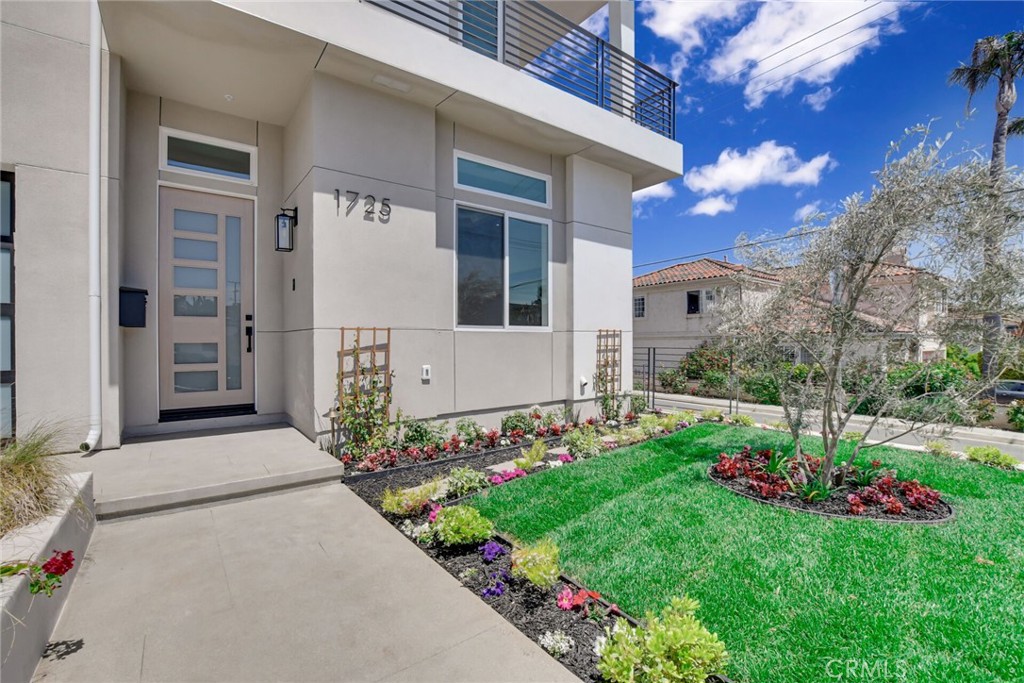 1725 Clark Lane Redondo Beach, CA 90278 - Photo 5 of 47 a front view of a house with a yard