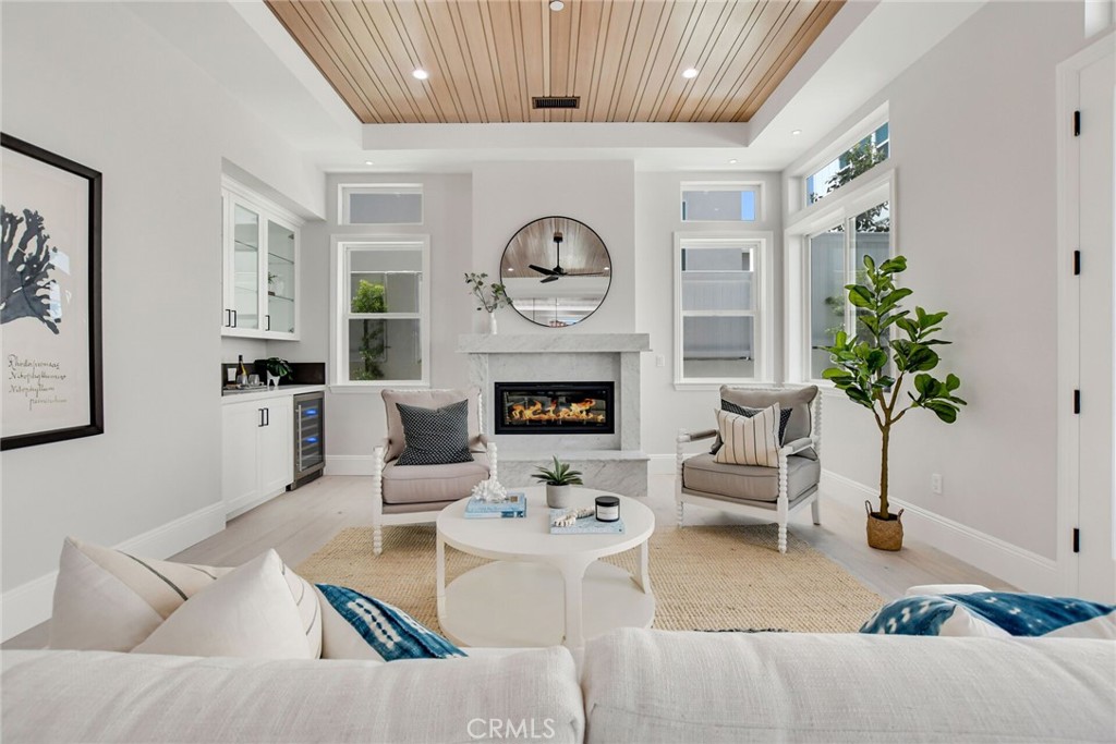 1725 Clark Lane Redondo Beach, CA 90278 - Photo 7 of 47 a living room with furniture and a fireplace