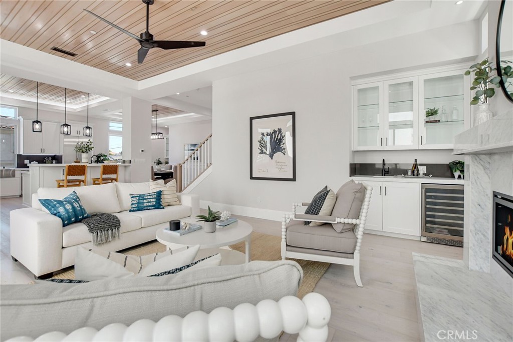 1725 Clark Lane Redondo Beach, CA 90278 - Photo 10 of 47 a living room with furniture and a chandelier
