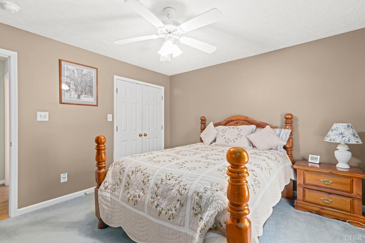 298 Braxton Ridge Road Amherst, VA 24521 - Photo 30 of 65 a bedroom with a bed and hallway