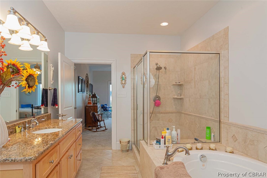 102 Ferry Road Hartfield, VA 23071 - Photo 36 of 42 Walk-in glass shower, oversized jacuzzi jetted tub