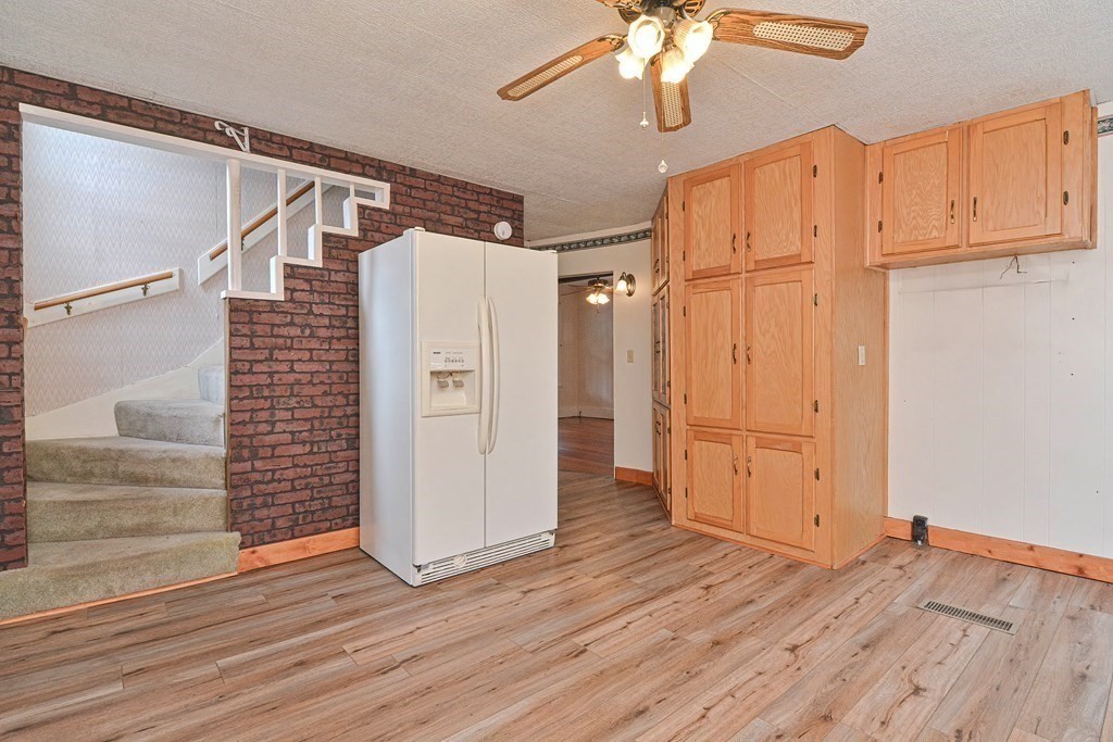 775 3rd Avenue Woonsocket, RI 02895 - Photo 12 of 42 a view of walk in closet with wooden floor