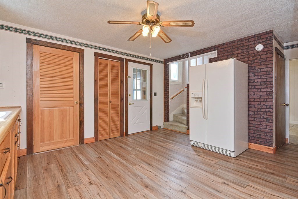 775 3rd Avenue Woonsocket, RI 02895 - Photo 17 of 42 wooden floor in an empty room with a window