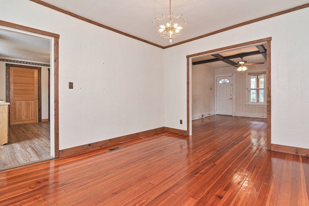 775 3rd Avenue Woonsocket, RI 02895 - Photo 20 of 42 wooden floor in an empty room with a window