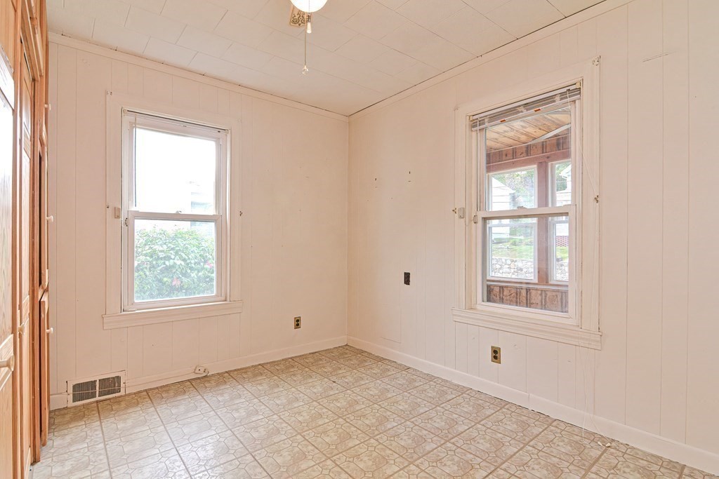 775 3rd Avenue Woonsocket, RI 02895 - Photo 23 of 42 an empty room with windows