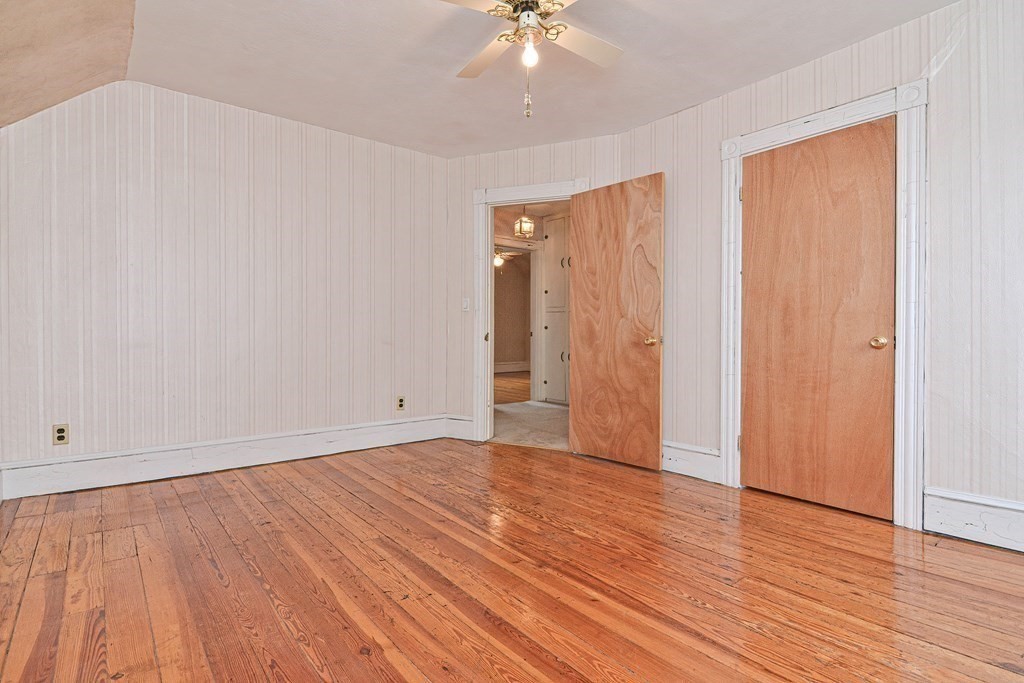 775 3rd Avenue Woonsocket, RI 02895 - Photo 27 of 42 a view of an empty room with wooden floor