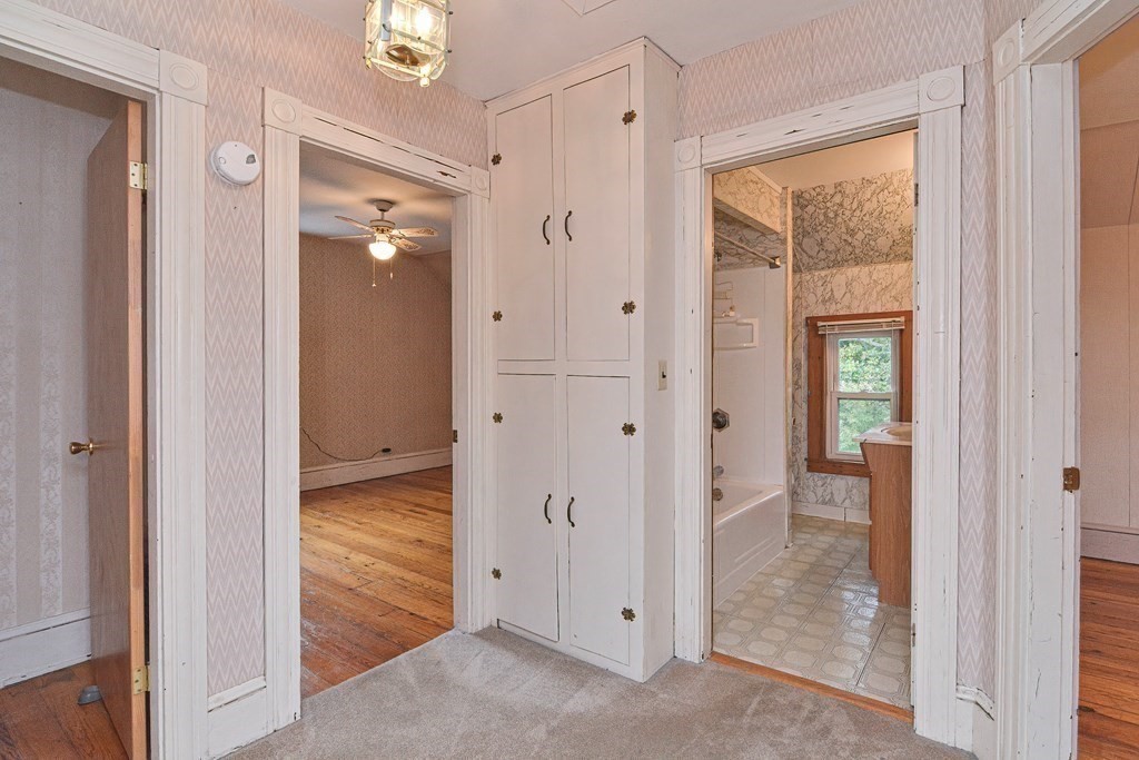 775 3rd Avenue Woonsocket, RI 02895 - Photo 28 of 42 a view of a bathroom with a glass door shower