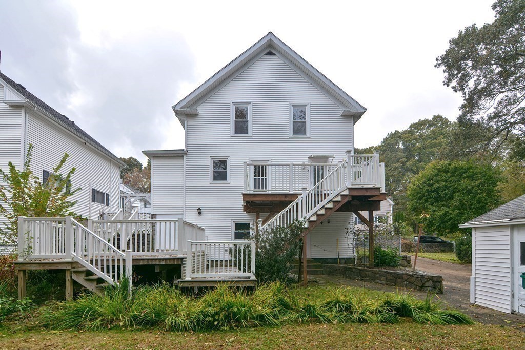 775 3rd Avenue Woonsocket, RI 02895 - Photo 3 of 42 a view of a big yard in front of house