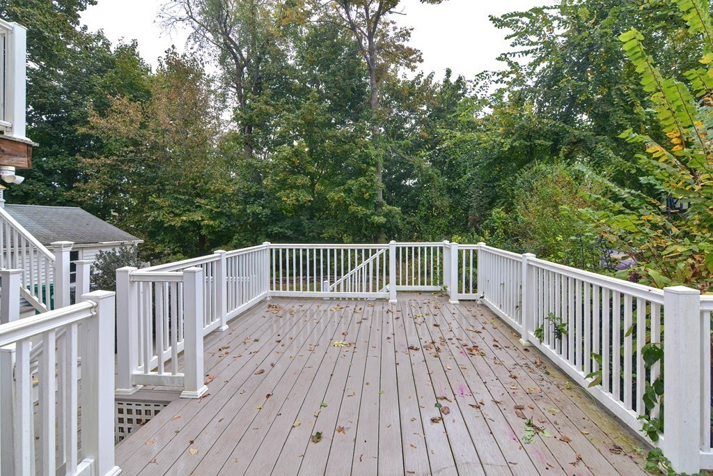775 3rd Avenue Woonsocket, RI 02895 - Photo 37 of 42 a view of balcony with wooden floor and fence