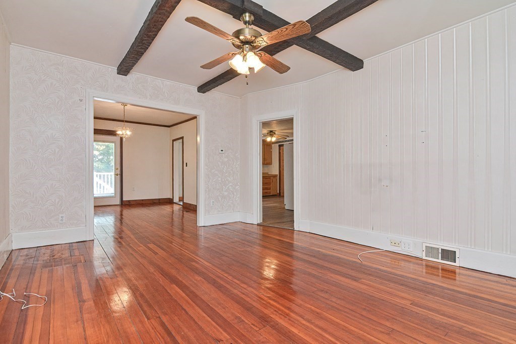 775 3rd Avenue Woonsocket, RI 02895 - Photo 10 of 42 a view of an empty room with wooden floor