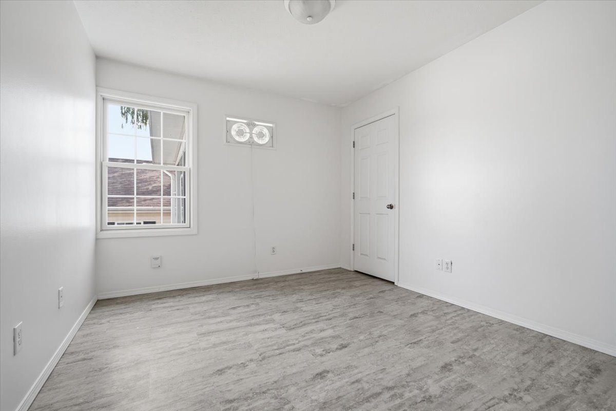 915 Teegan Street Normal, IL 61761 - Photo 15 of 33 an empty room with windows
