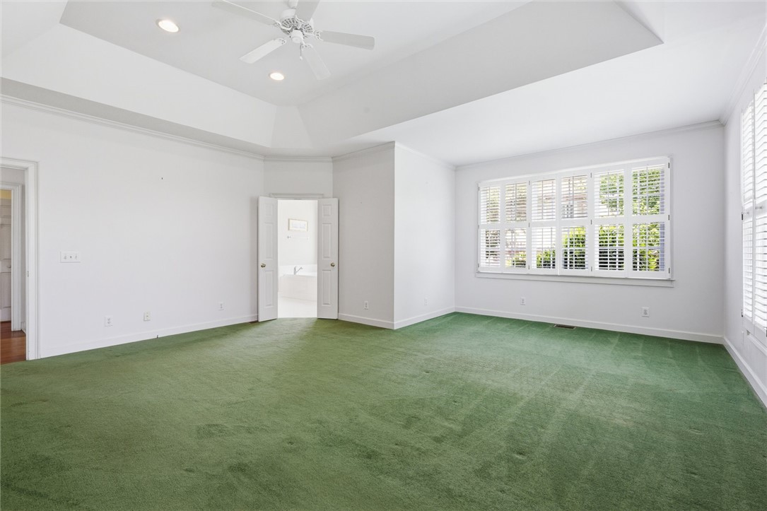 110 Garden Gate Drive Anderson, SC 29621 - Photo 19 of 35 This spacious bedroom offers abundant natural light and private access to an attached bath.