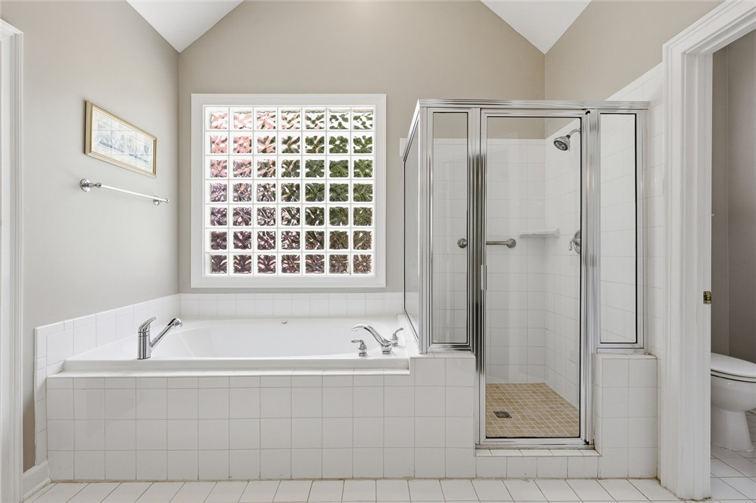 110 Garden Gate Drive Anderson, SC 29621 - Photo 22 of 35 This serene bathroom offers a soaking tub and a spacious shower.