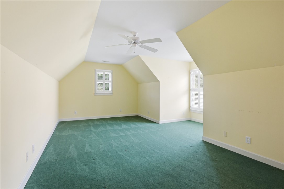 110 Garden Gate Drive Anderson, SC 29621 - Photo 29 of 35 This spacious room features vaulted ceilings and ample natural light, ideal for a peaceful retreat.