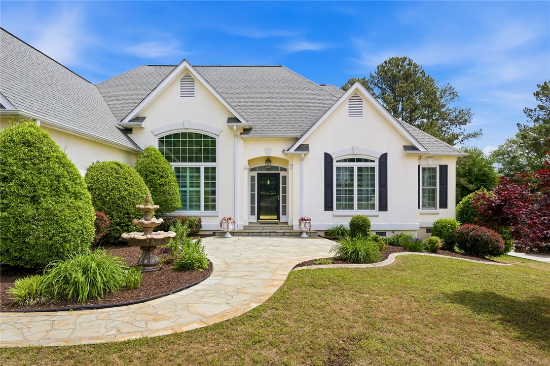 110 Garden Gate Drive Anderson, SC 29621 - Photo 3 of 35 This captivating residence boasts a a charming stone pathway leading to the entrance.