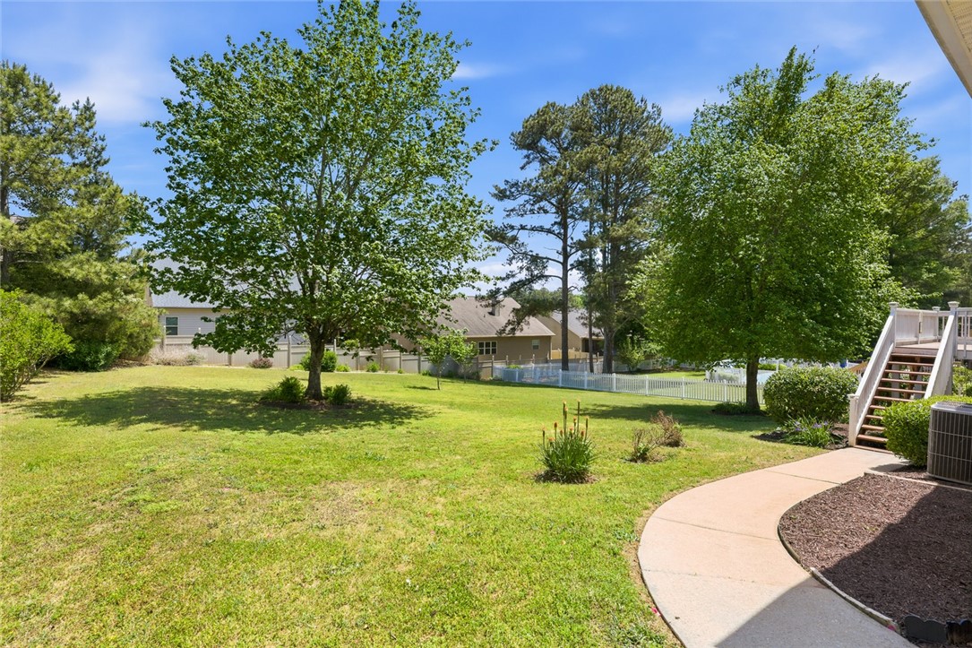 110 Garden Gate Drive Anderson, SC 29621 - Photo 33 of 35 This spacious yard offers a vibrant green lawn and lots of room for all kinds of activities.