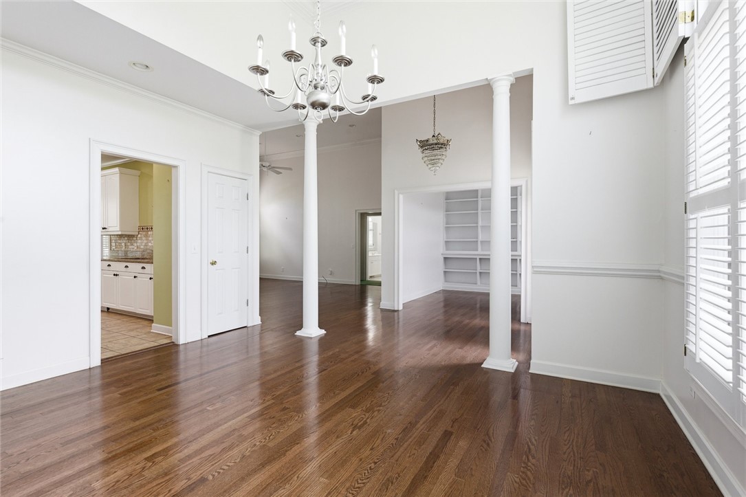 110 Garden Gate Drive Anderson, SC 29621 - Photo 8 of 35 This bright room showcases polished hardwood floors, soaring ceilings, and elegant architectural columns.