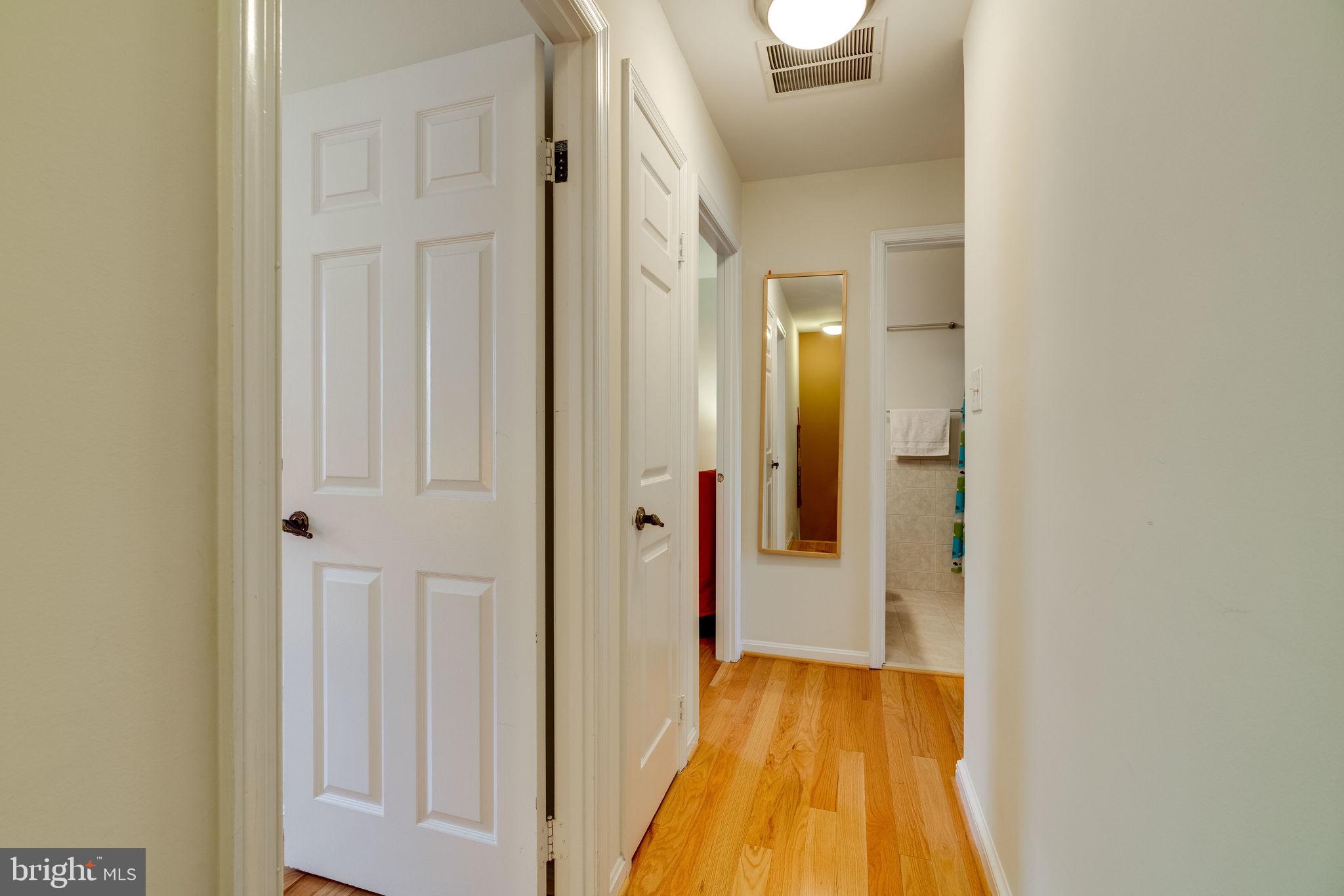 8969 Omega Court Springfield, VA 22152 - Photo 21 of 46 Hall way to the bedrooms upstairs