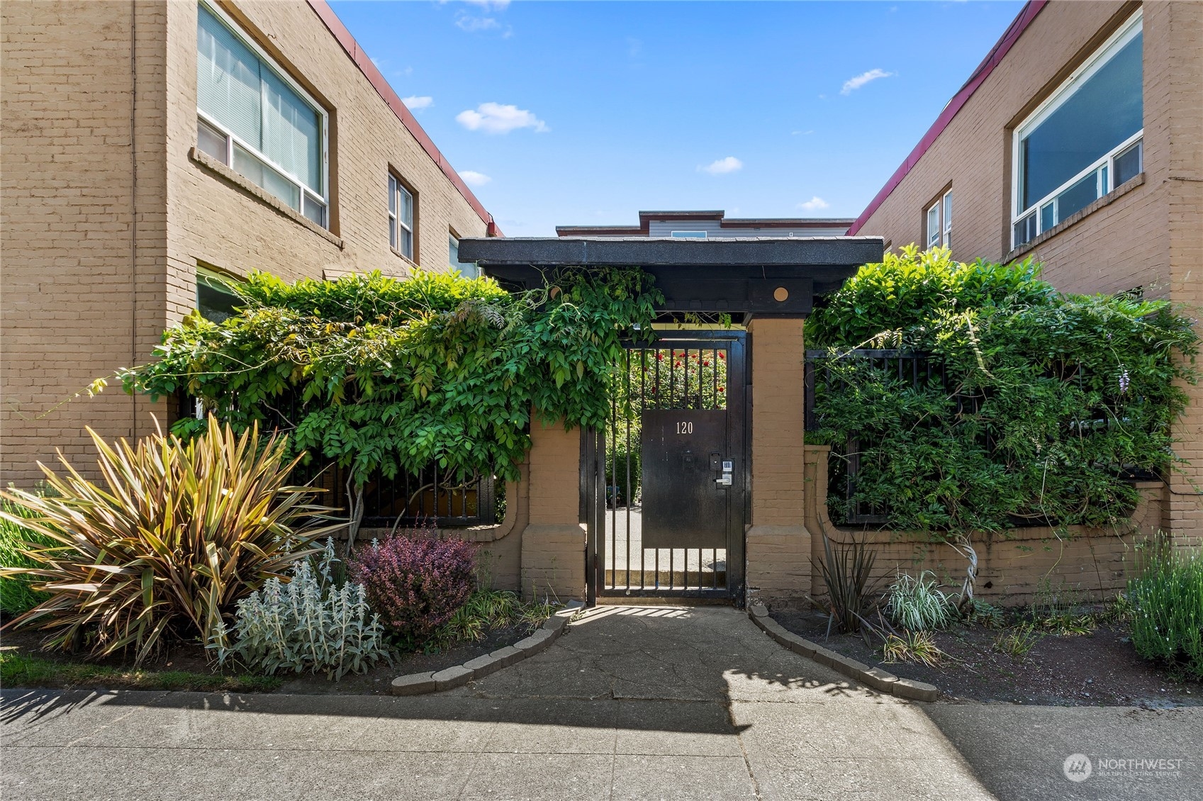 a view of a building with a yard