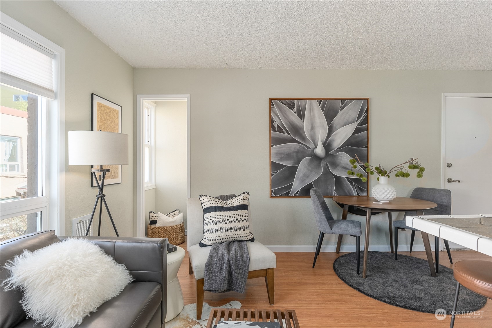 120 14th Avenue, Unit 10 Seattle, WA 98122 - Photo 11 of 21 a living room with furniture and a table