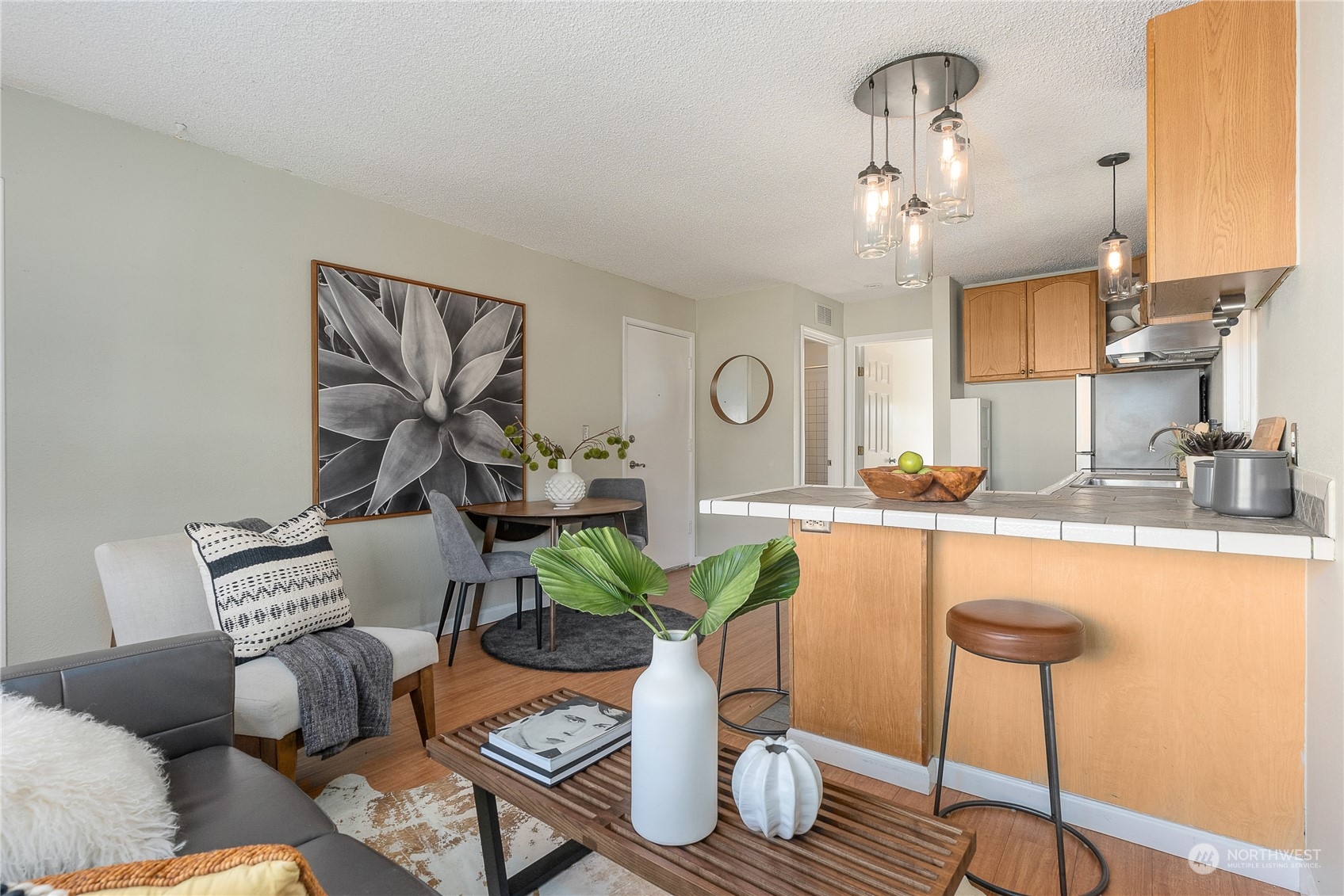 120 14th Avenue, Unit 10 Seattle, WA 98122 - Photo 13 of 21 a living room with furniture and wooden floor