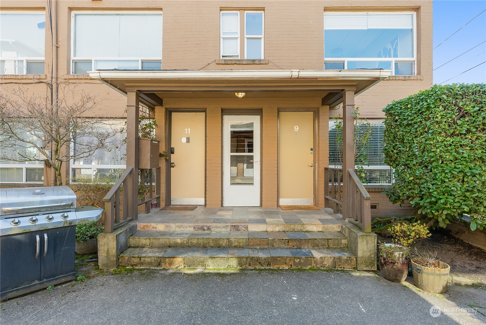120 14th Avenue, Unit 10 Seattle, WA 98122 - Photo 5 of 21 a front view of a house with a outdoor space