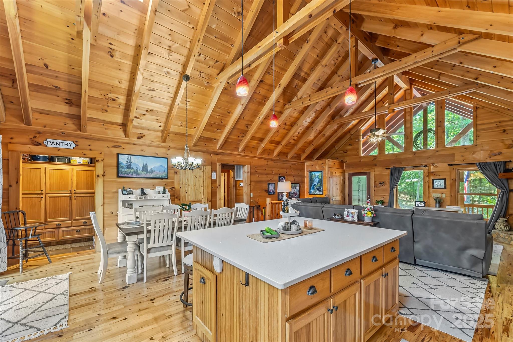 279 Outback Trail Nebo, NC 28761 - Photo 14 of 45 a view of a kitchen with a sink and chairs