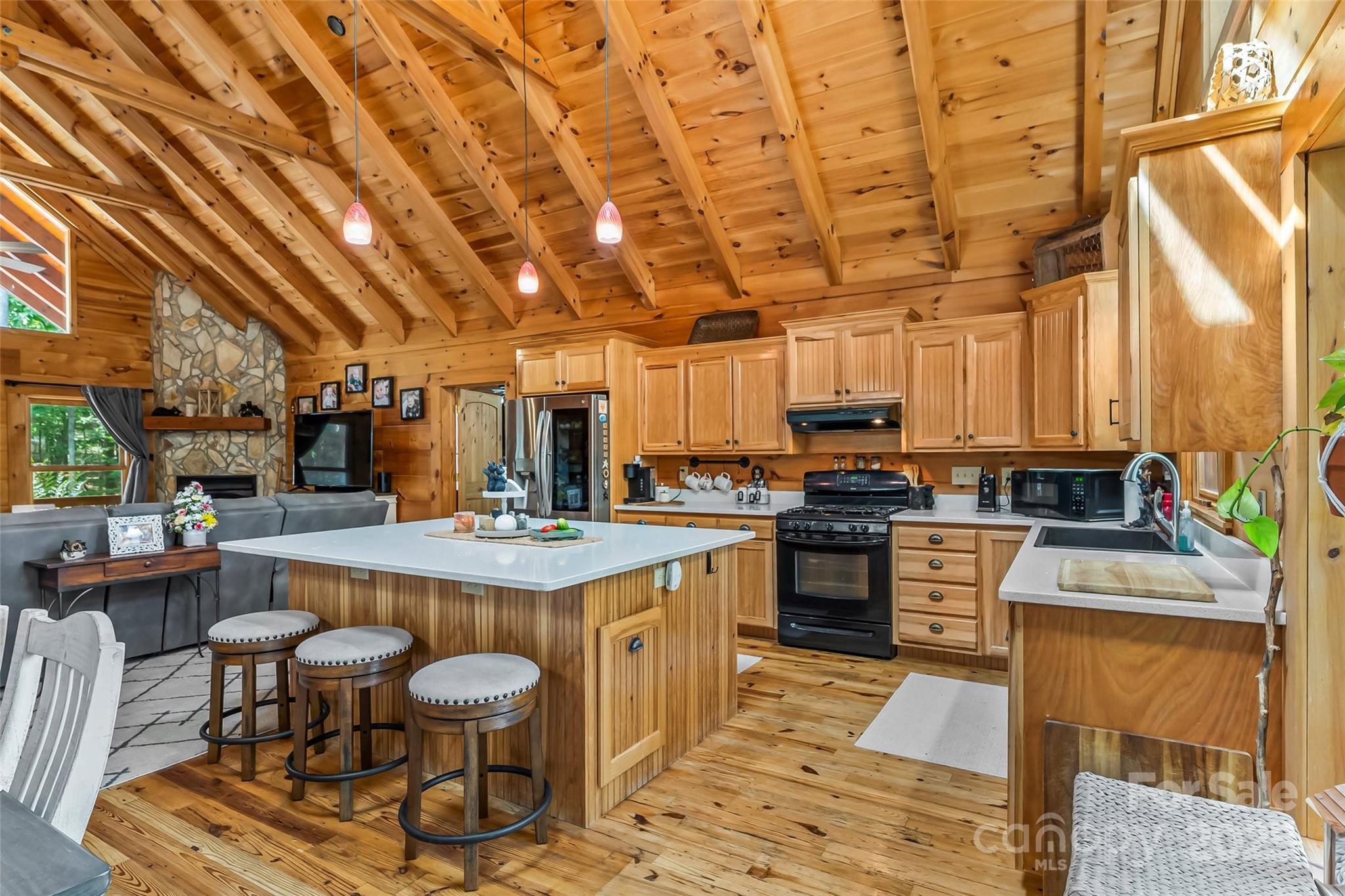 279 Outback Trail Nebo, NC 28761 - Photo 18 of 45 a kitchen with stainless steel appliances granite countertop a stove and cabinets