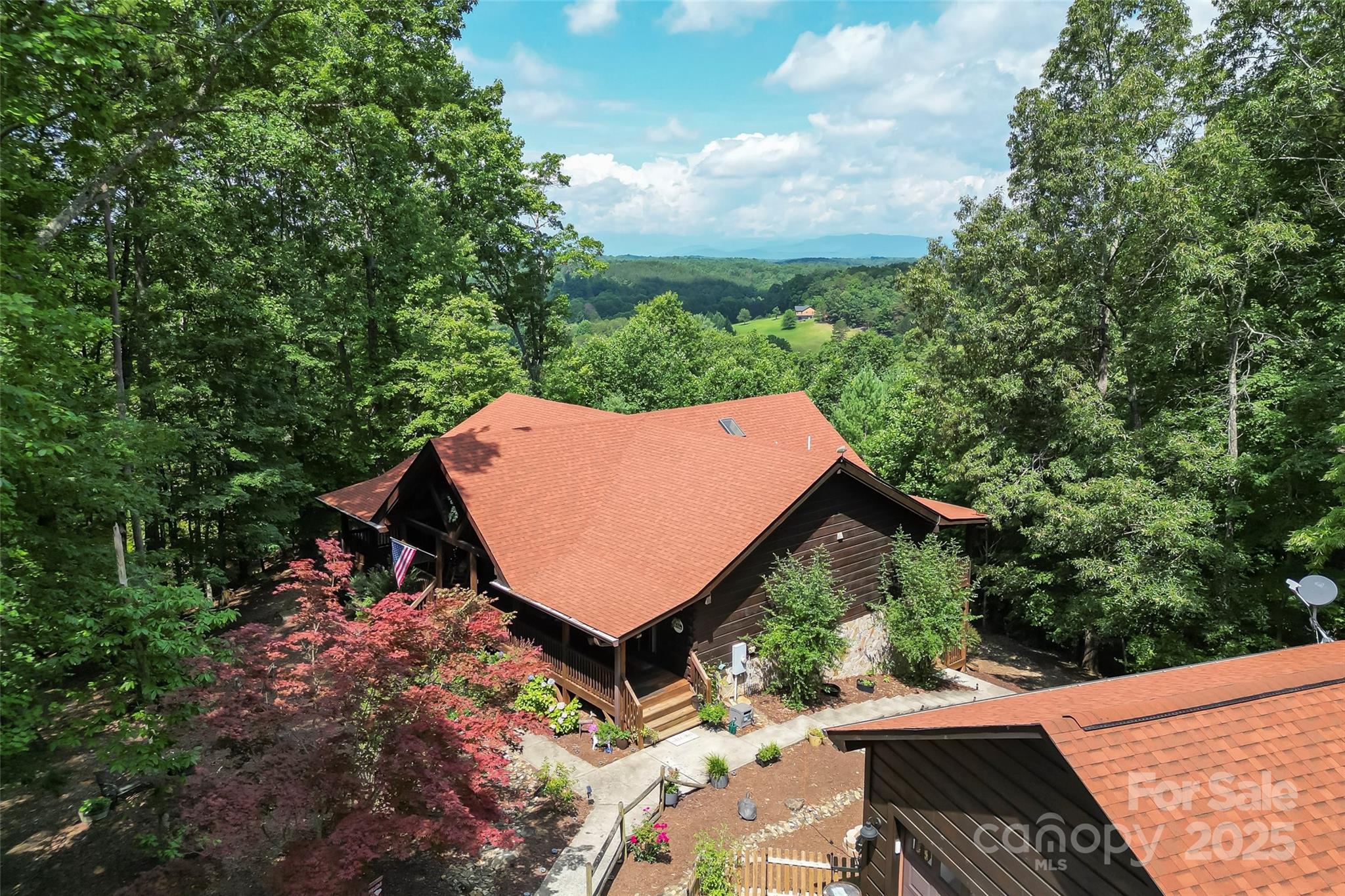 279 Outback Trail Nebo, NC 28761 - Photo 2 of 45 an aerial view of a house around side of green space