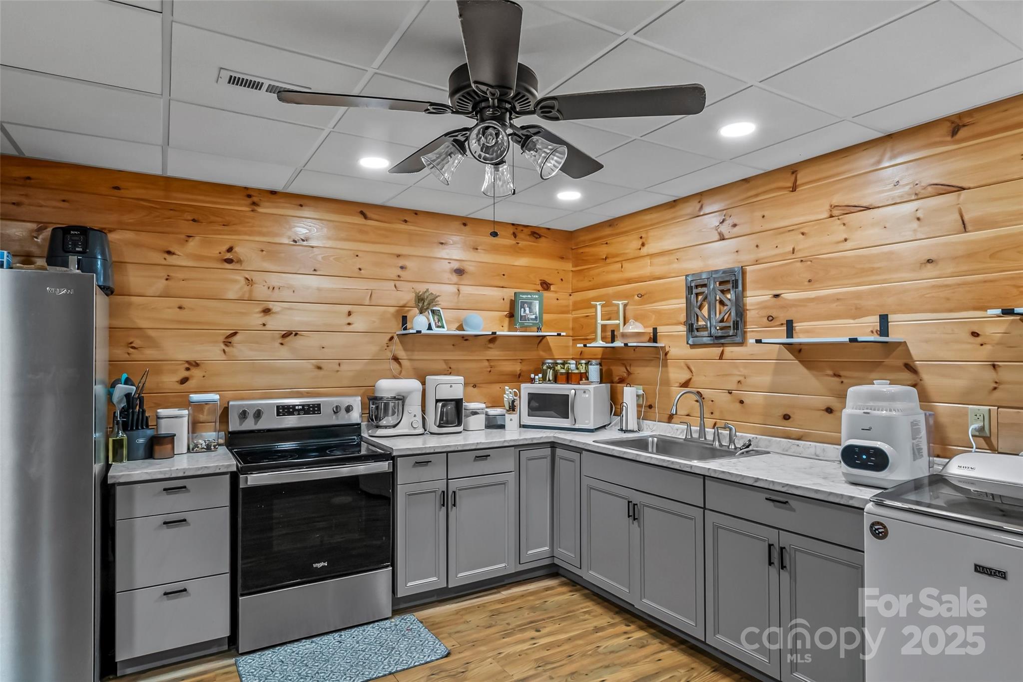 279 Outback Trail Nebo, NC 28761 - Photo 34 of 45 a kitchen with a sink appliances and cabinets
