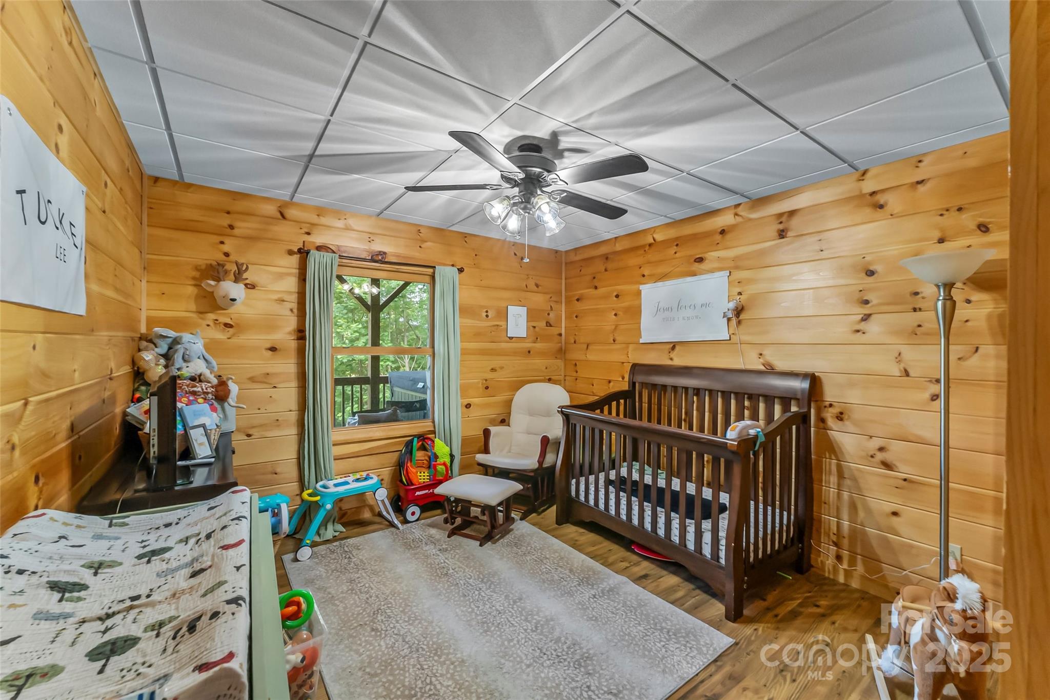 279 Outback Trail Nebo, NC 28761 - Photo 38 of 45 a bedroom with furniture and a window