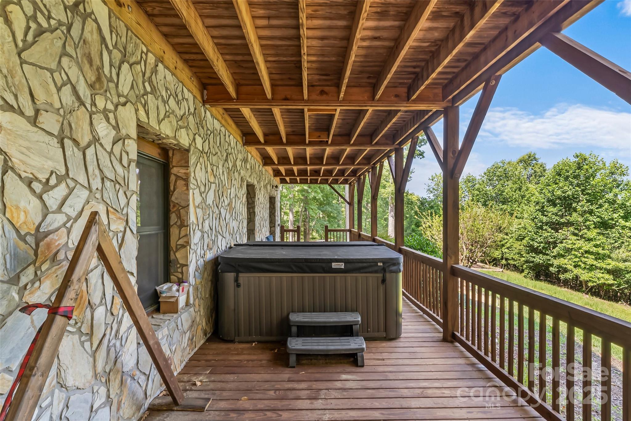 279 Outback Trail Nebo, NC 28761 - Photo 40 of 45 a view of entryway with wooden floor and outdoor space
