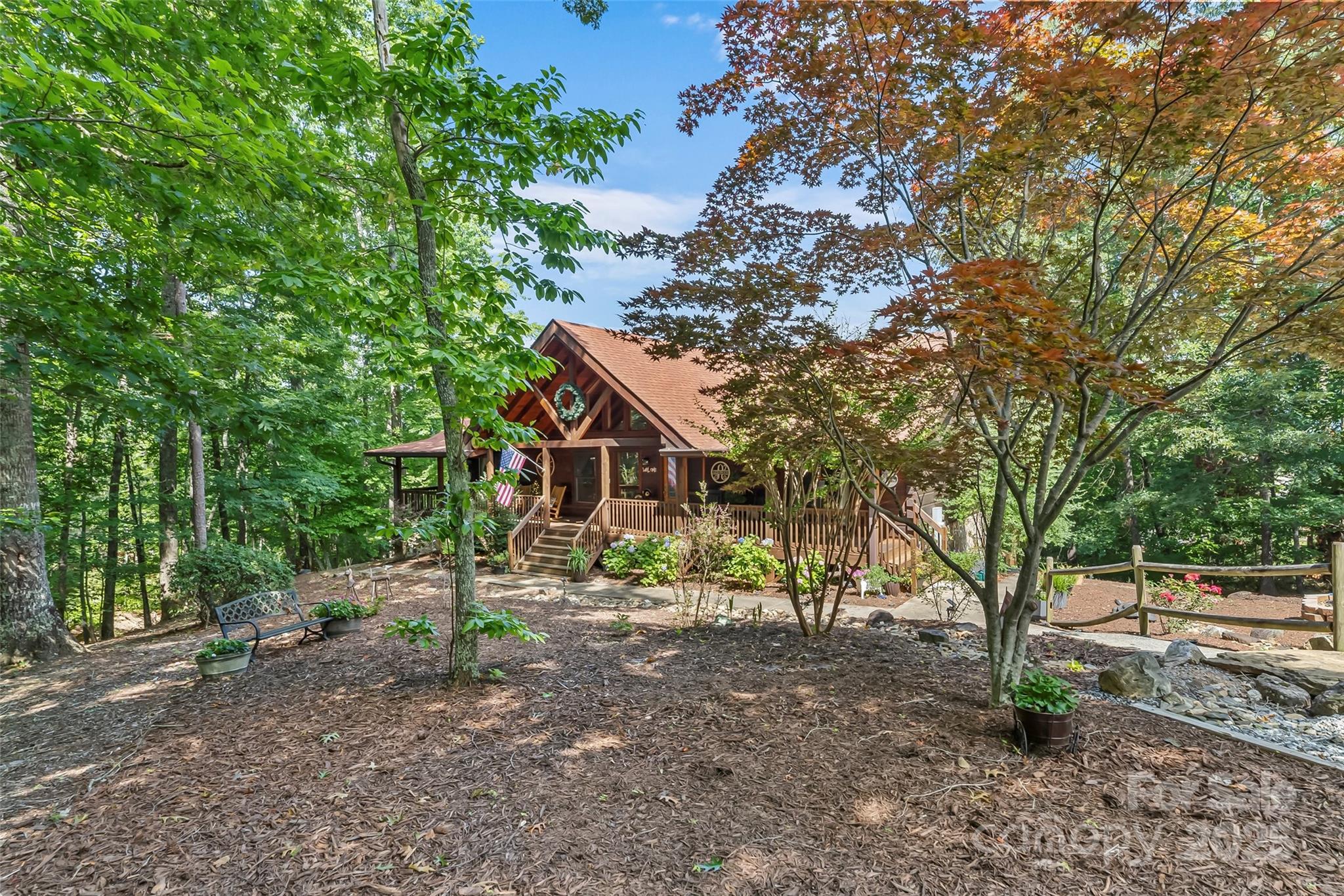 279 Outback Trail Nebo, NC 28761 - Photo 9 of 45 a view of a house with a yard