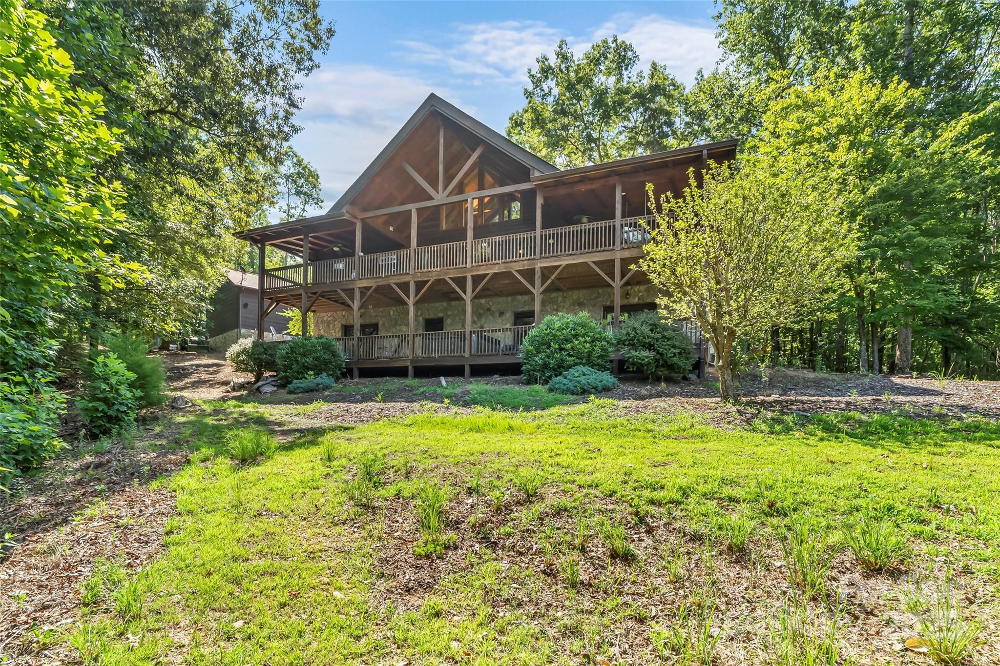 279 Outback Trail Nebo, NC 28761 - Photo 10 of 45 a front view of a house with a yard