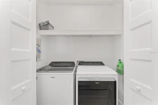 a view of a storage & utility room with stairs