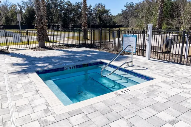 a view of a dinning table and chairs in the patio