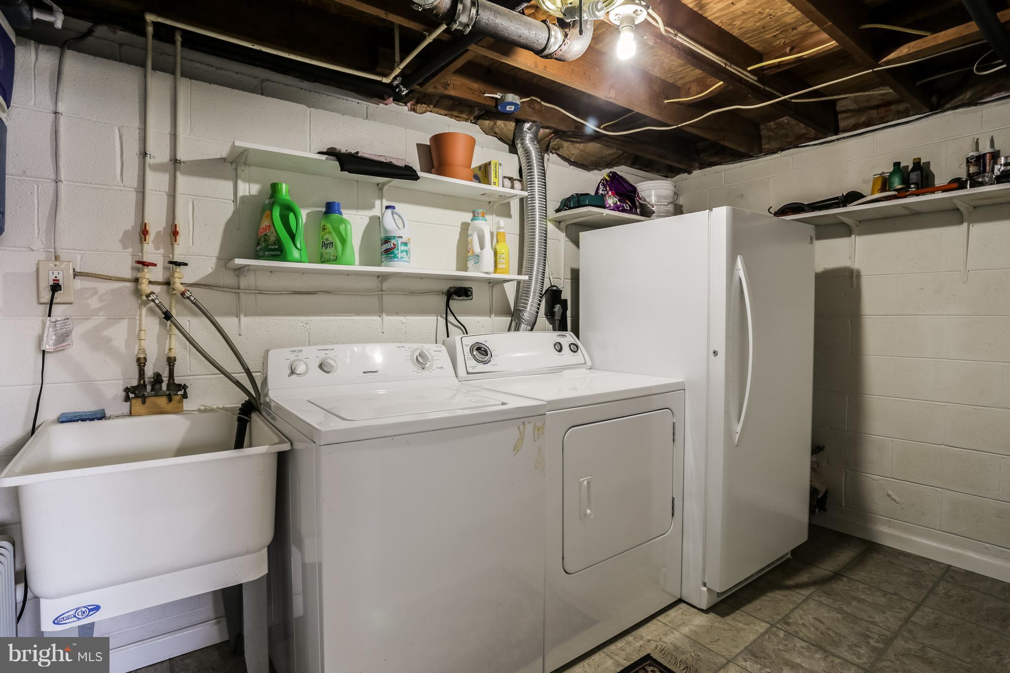 12182 Triadelphia Road Ellicott City, MD 21042 - Photo 20 of 30 Full sized laundry space