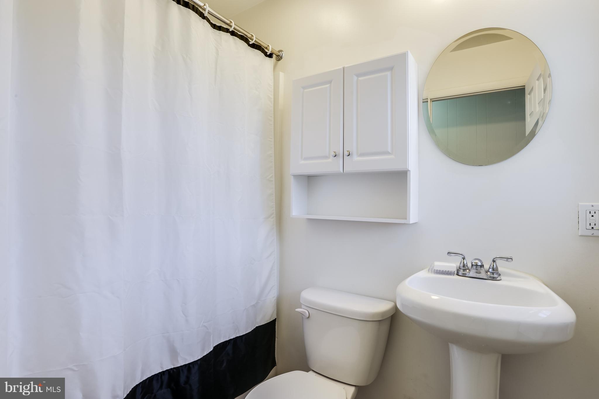 12182 Triadelphia Road Ellicott City, MD 21042 - Photo 23 of 30 Main Level Bath with tub